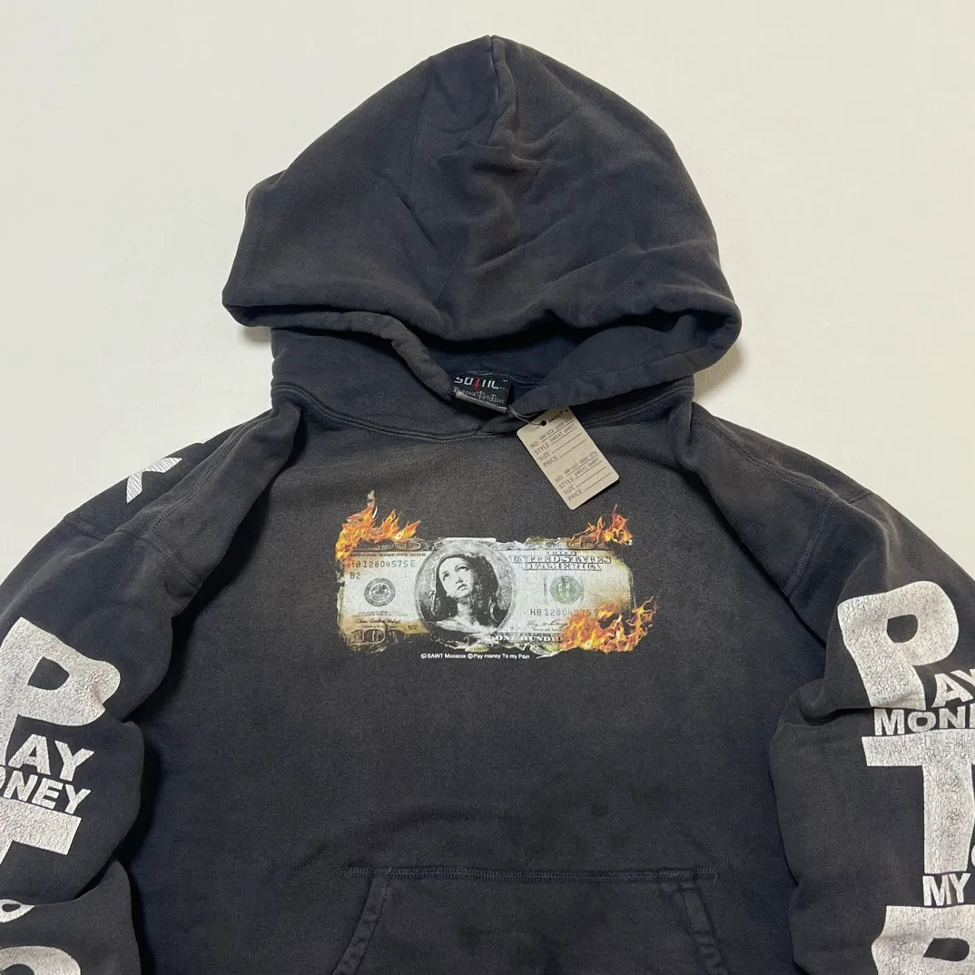SAINT Mxxxxxx × PAY MONEY TO MY PAIN PTP_HOODIE/BRAND MONEY/BLK Co-branded PTP Virgin Mary dollar hoodie Washed black S-XL Assute dyeing The whole piece is sprayed with horse fade Mold customization joint main mark/washed mark Factory four-needle and six-thread workmanship No bone seams More comfortable to wear Repeated modification of proofing Authentic grade crack printing VINTAGE value is full